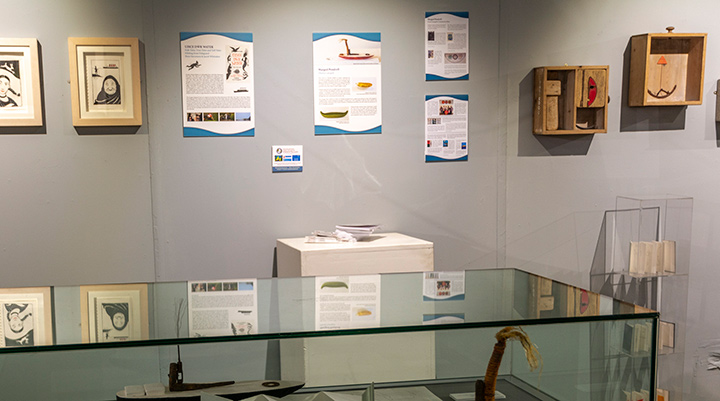 Manuscripts in a display case.