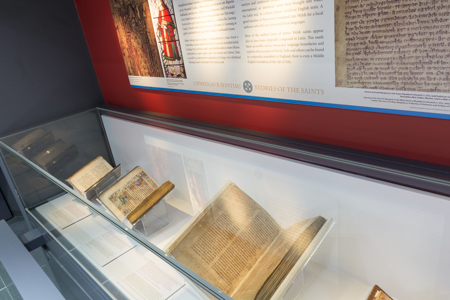 Manuscripts in a display case.